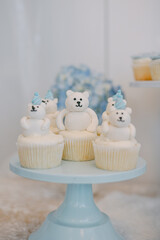 Cute bear cupcakes on display at a children's birthday party celebration