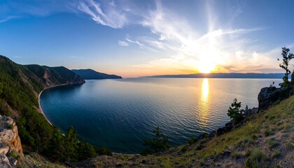 Fototapeta premium Panoramic sunset view over a serene lake, high angle