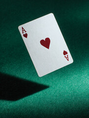 Fototapeta na wymiar Floating Ace of Hearts Playing Card on Green Felt