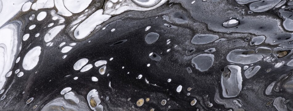 White and black abstract fluid art background with cells texture effect in acrylic pour painting style
