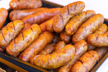 A tray of charcoal-grilled sausages
