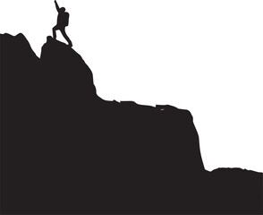 Obraz premium Silhouette of a triumphant hiker raising arm on a mountain peak