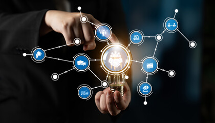 A business professional engages with a virtual interface showcasing various technology and data icons, representing innovation and connectivity in modern enterprises. Crux