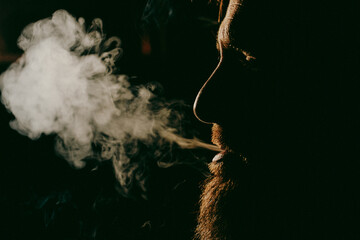 addicted man smoking a cigarette quit smoking