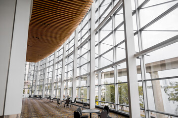 Interior view of modern building architecture with conference tables in Detroit.