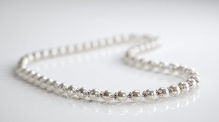 Obraz premium Silver beaded necklace