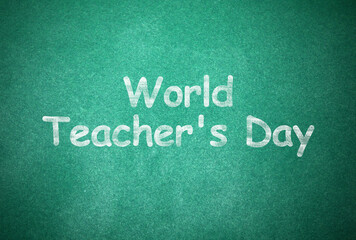 Obraz premium Happy Teacher's Day greeting card. Text on green chalkboard