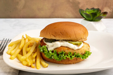salmon burger  with  fries