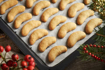 Freshly baked sweet Christmas cookies called vanilla crescents or Kipferl