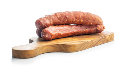 Smoked sausages on cutting board isolated on white background.