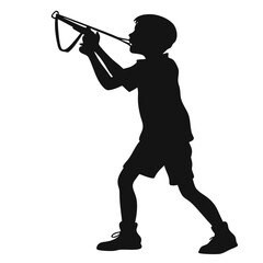 Boy standing with slingshot