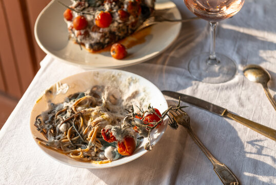 Moldy Waste Pasta on Plate, Food consumerism and excess