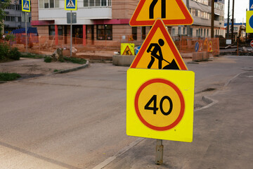 Road Construction Signs Indicate Speed Limit in Urban Area