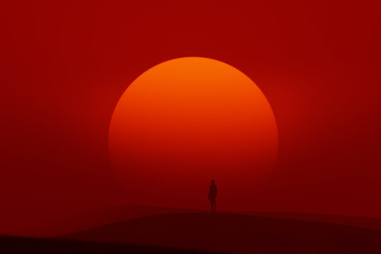 Sunset Over a Silhouette Walking in a Foggy Landscape