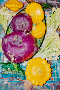 Colorful assortment of fresh vegetables on a decorative platter