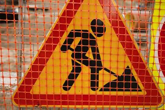 Warning Sign Indicating Construction Work in Progress at a Site