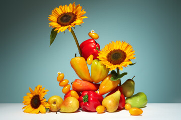 Still life with Fruits and Flowers on Gradient Blue Background.