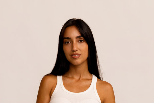 Woman With Long Hair Posing in Casual Attire Indoors