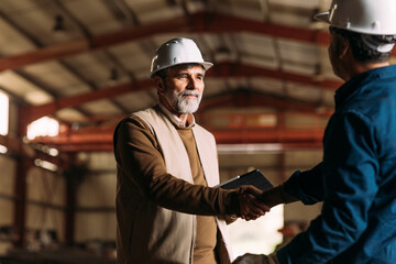 Employees shaking hands