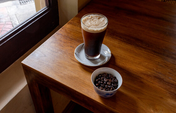 Nitro cold brew coffee inside a cafe