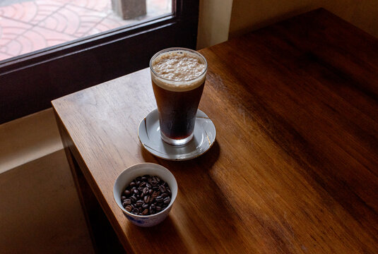 Nitro cold brew coffee inside a cafe
