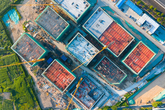 Vertical Aerial View of Construction Site with Workers