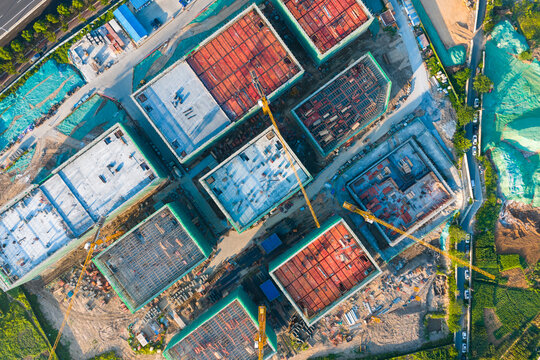 Vertical Aerial View of Construction Site with Workers