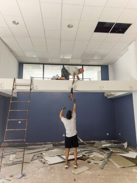 men at a construction site in a commercial establishment