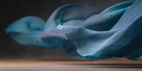 Blue fabric is blowing in the wind