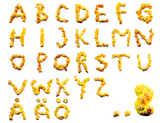 Naklejka premium Typo letters of saffron buns. Typography with clipping path and full alphabet. Creativity and joy with baking during Christmas and Swedish Lucia