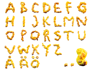 Typo letters of saffron buns. Typography with clipping path and full alphabet. Creativity and joy with baking during Christmas and Swedish Lucia