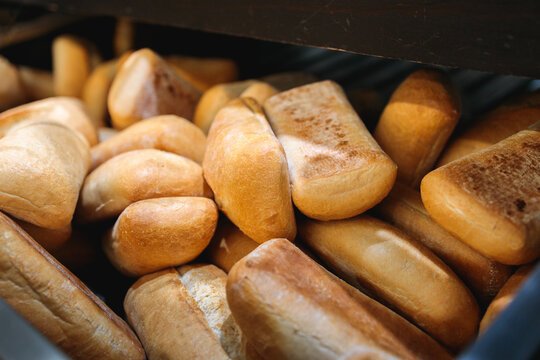 Assortment of fresh sandwich rolls at supermarket bakery