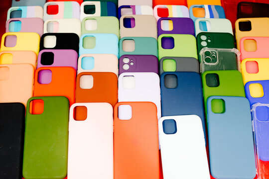 Close-up shot with flash of several colorful smartphone cases