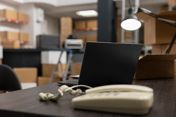 Storage room with logistics and shipping area of a local retail business, space used for product handling and hand packing to ensure the distribution of goods. Industrial warehouse.