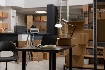 Industrial storehouse with in house logistics and products of a retail local brand, space used for hand packing goods to ensure small business distribution. Industrial warehouse shelves.