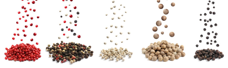 Various types of peppers falling against white background, set