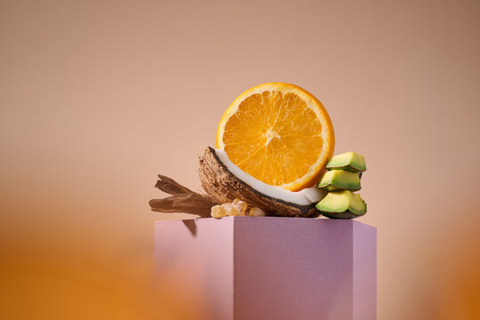 A creative arrangement of fresh fruits, coconut, and wooden details