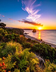 Coastal sunset over a rocky shore