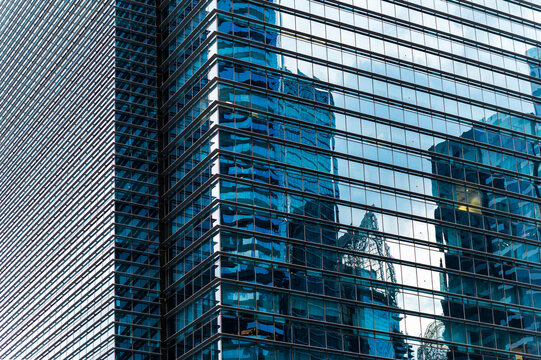 Glass skyscrapers overlap in downtown corporate skyline