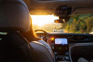 Driving Car During Scenic Sunset
