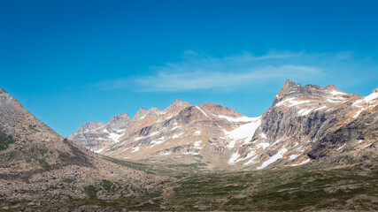Obraz premium Blue Skies, Glaciers, mountains and Icebergs of Prins Christian Sund, South Greenland, August 2025