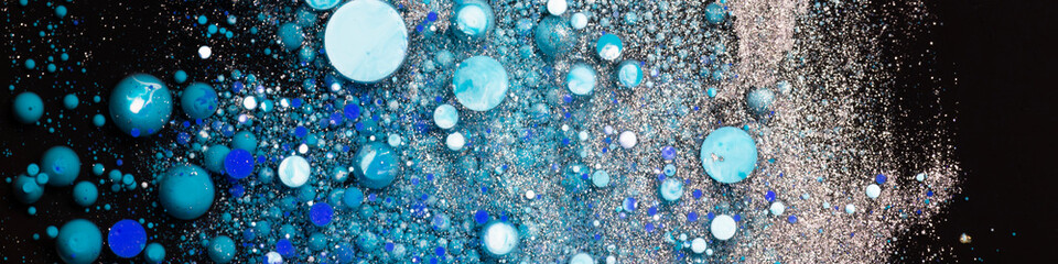Abstract blue turquoise bubbles texture on dark background cosmic liquid art design