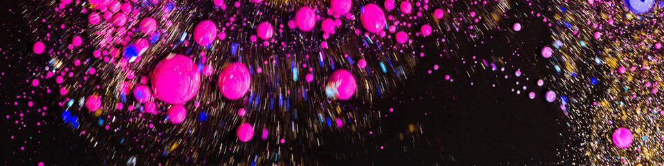Abstract glamour background with neon pink gold glitter bubbles liquid texture luxury party fashion design