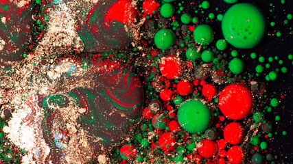 Christmas abstract background with red green gold bubbles liquid art texture holiday festive decoration design