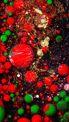 Christmas abstract background with red green gold bubbles liquid art texture holiday festive decoration design