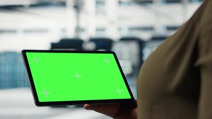 Server room admin uses isolated screen tablet to increase supercomputers workload capacity. Data center worker configures gear with chroma key device notebook, improving processing speed, camera B - Powered by Adobe