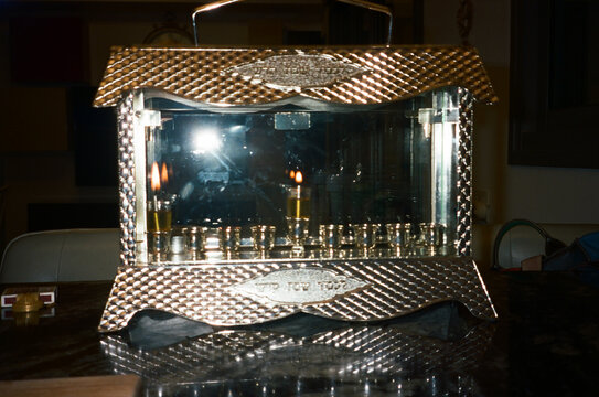 First Night of Hanukkah With Beautifully Lit Menorah.Analog 35mm photo