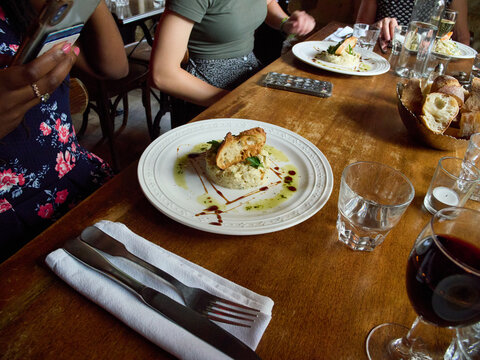 Fine Dining Experience at a Cozy Restaurant With Friends