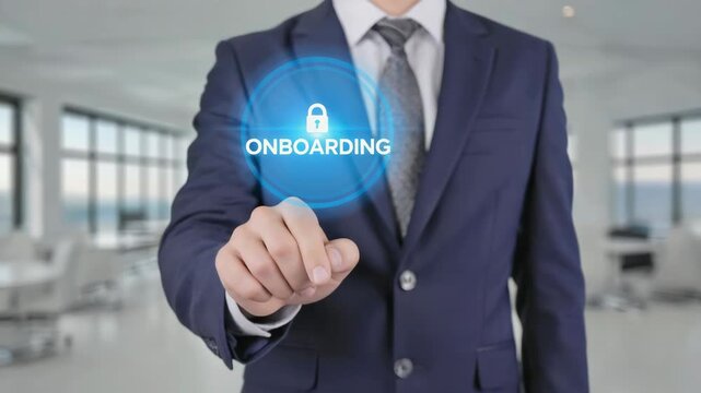 Business professional in suit holding a tablet with onboarding process start button, indicating security protocols and virtual guidance for new employees.