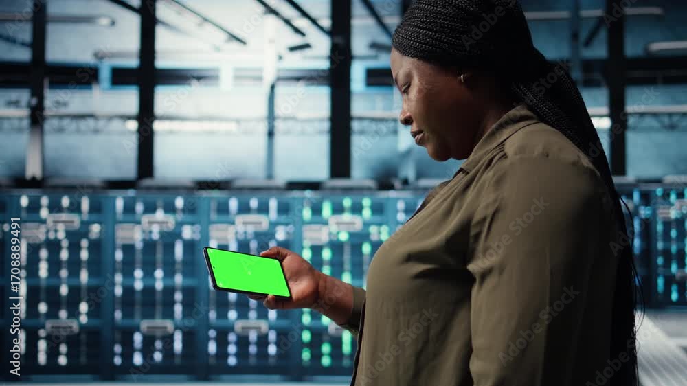 Poster server hub admin uses isolated screen smartphone to watch video tutorial on how to increase rigs wor
